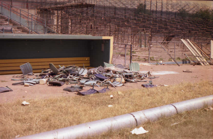 Abandoned: Pile of broken seat backs in front of the third base (visitors) dugout (Source: Robin Hanson)